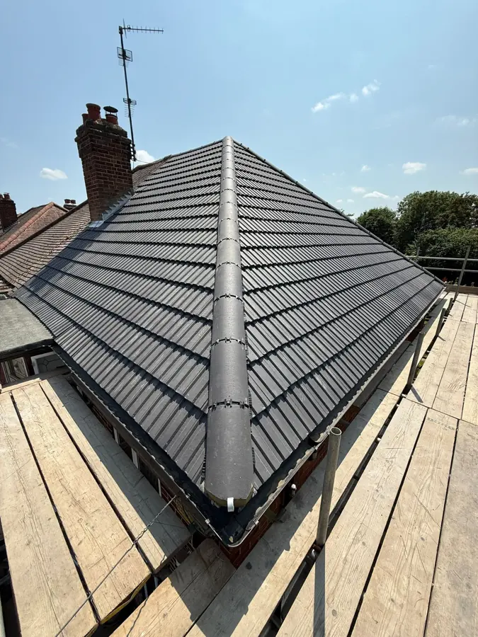 New grey tiled roof installed by T.Harris Roofing in Chingford