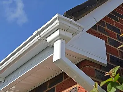White guttering fascia soffit and downpipe roofline installation